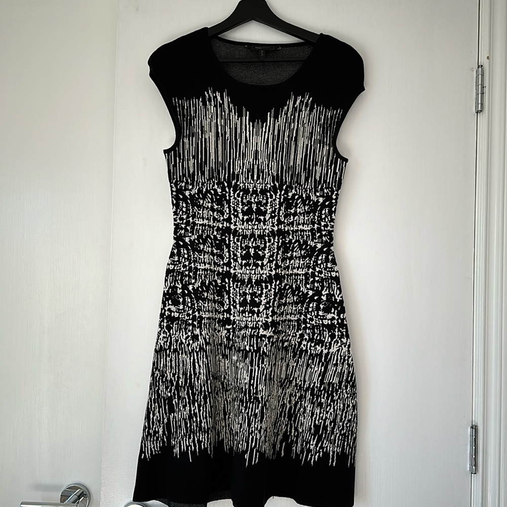Classic BCBG knit dress . Great condition barely worn.
